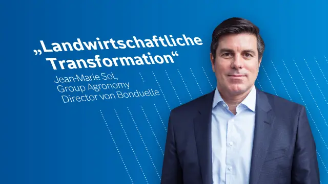 Jean-Marie Sol, Group Agronomy Director von Bonduelle vor einem blauen Hintergrund.