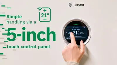 Melanie Wingerter’s finger swipes across the touch control panel attached to the ground source heat pump.