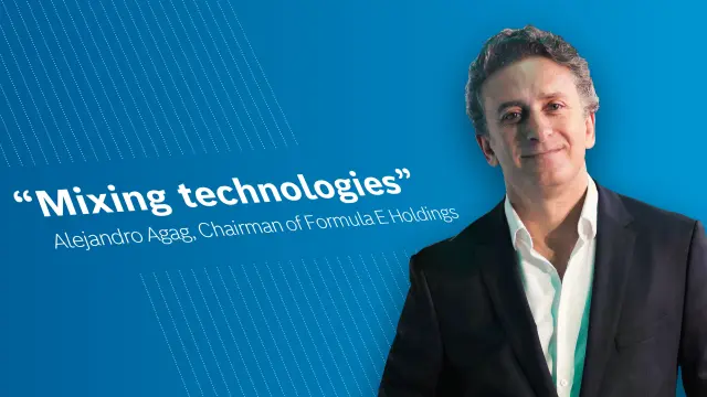 Alejandro Agag, Chairman of Formula E Holdings in front of a blue background.
