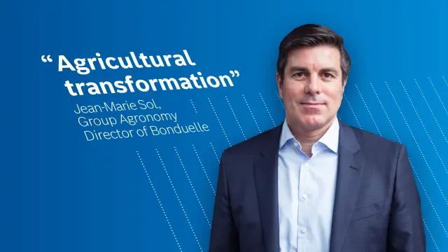 Jean-Marie Sol, Group Agronomy Director of Bonduelle in front of a blue background.