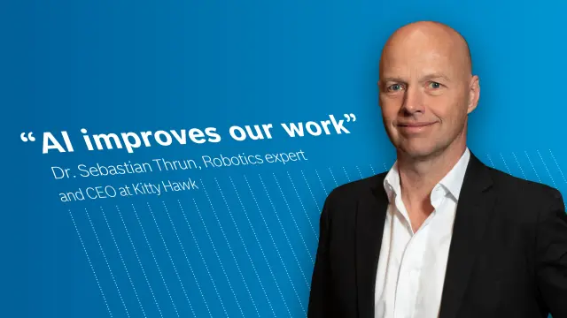 Sebastian Thrun against a blue background. On the picture is the quote: “AI improves our work.” 