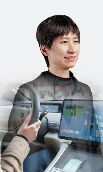 Person on a light background, overlaid with a vehicle interior and digital display.