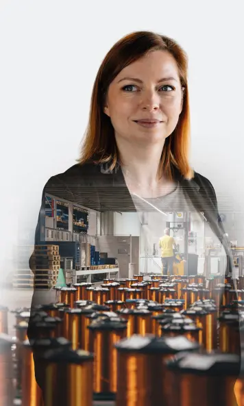 Person on a light background, overlaid with a warehouse interior and rows of coils.