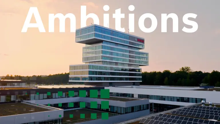 Bosch-Logo an einem modernen Gebäude mit horizontalen Metallstreben.
