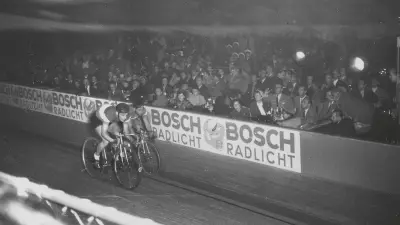 Bosch bicycle light advertisement at a cycle race, 1955