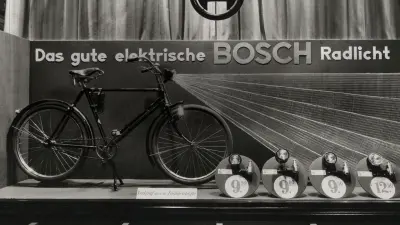 Cover picture showing a Bosch bicycle light display window, 1936