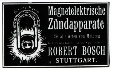 Black newspaper clipping with “magnetic ignition devices” and “Robert Bosch” in white letters