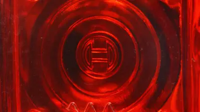 Close-up of a car’s rear light with the Bosch logo in the center