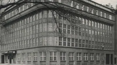 Modern, rigidly structured commercial building on a street corner