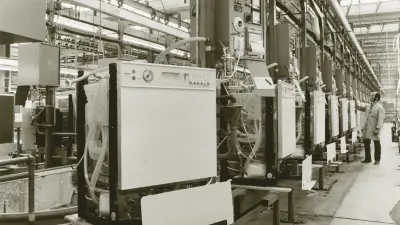 Factory with several dishwashers in assembly line production