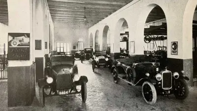 The interior of a repair shop with automobiles