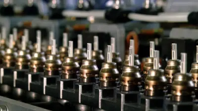 Lambda sensors without their housing on a production line