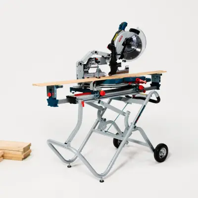A miter saw on an adjustable saw table