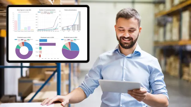 A human imagery of a man in the warehouse looking at the Origify Management portal for business optimization
