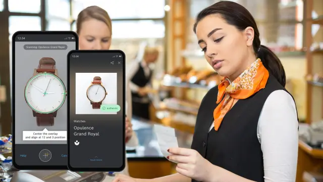 A human image of a retailer verifying a watch through the Origify smartphone application and receiving instant verification of authenticity. 