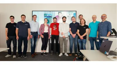 Group photo of the cooperation members at a meeting at Bosch Research headquarters in Renningen, Germany. Current findings from computer vision research are presented.