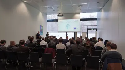 Daniel Schmidt, Bosch coordinator of the "KIsSME" funding project, gives a presentation during the final event at Bosch Research in Renningen.