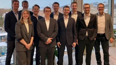 The Bosch IoT Lab team in December 2022 in front of a snowy landscape.