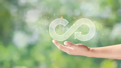 At Bosch Research, we are looking at ways of conserving resources when manufacturing various Bosch products. The graphic shows a green, slightly blurred landscape in the background and in the foreground a plant growing from two hands. The hands are surrounded by icons which symbolize sustainable activities at Bosch Research.