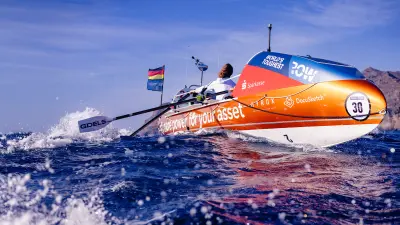 Two person rowing in a boat across the Atlantic.
