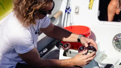 A person maintaining on the water desalination plant.