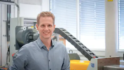Bosch researcher Daniel Neyer with the AI-based Smart Test Facility Automation project at the Bosch Research Campus in Renningen, Germany.