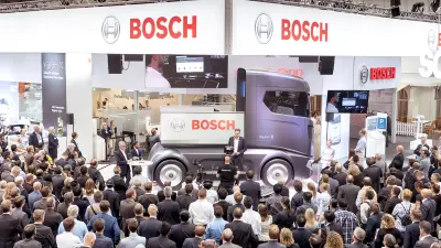 Visitors throng to the Bosch booth at the IAA to see the presentation of the Vision X concept study.
