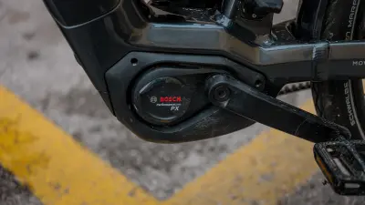 Close-up of a Bosch Performance Line PX e bike motor near the crank arm.