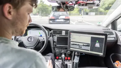 Visualization of sensor data in prototype vehicle: Tobias Frye in one of the prototype vehicles from Bosch Research