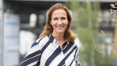 Portrait photo of Katja Nettesheim, Founder and CEO of _MEDIATE GmbH.