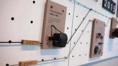 First Bosch eBike ABS displayed on a wall-mounted exhibit labeled Safety.