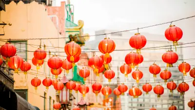 The image shows red Asian lanterns.