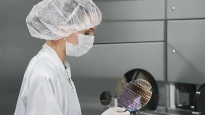 Mirjam Henn at the cleanroom at the Bosch Research campus in Renningen, Germany. Researching wide bandgap power transistors to enhance the efficiency of electromobility.
