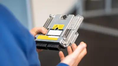 An Electronic Control Unit (ECU): Between 30 and 150 of these “little computers” are used in modern cars, making accurate data transfer between them crucial for vehicle safety.