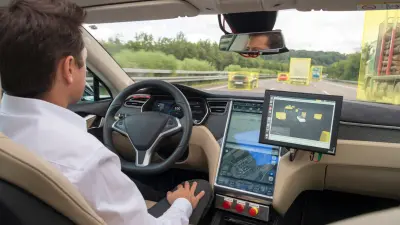 View from the back seat of a car through the windshield. Cars driving ahead are detected on a monitor.