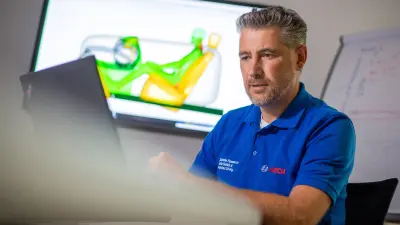 Gian in front of a monitor with a human body model