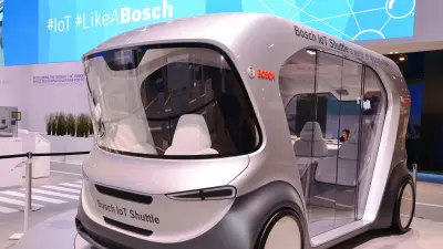 The Bosch IoT shuttle at an exhibition booth.