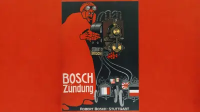 Mit rotem Bart und Haaren sowie seinem langen roten Staubmantel wurde Camille Jenatzy zur Werbefigur. Als „Roter Teufel“ warb er bis 1918 für die Bosch-Zündung.