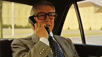 Bosch OF4 car telephone (1983). Bosch had run a radio technology section since 1954, which developed the first car telephones. In the 1980s, these were as expensive as a compact car.