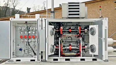 The hydrogen tank system is seen in the open container.