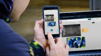 View of the display of Roberto Rivadeneira's smartphone and laptop — the MeasureOn app can be seen on both.