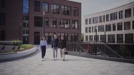 Benjamin and his colleagues walk together outside at the Bosch site.