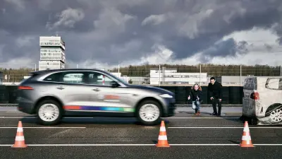 Andreas Schulz and Matthias Birk watch with satisfaction as a vehicle equipped with an MPC3 camera brakes to avoid hitting another vehicle.