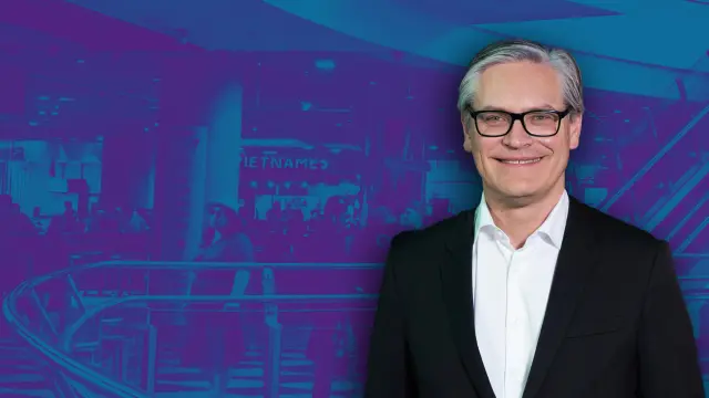 Alexander Otto against a blue background.