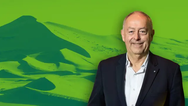 Franz Josef Radermacher against a green background.