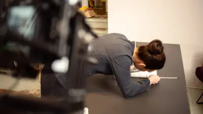 You can see Dominique, the master pastry chef, in the middle of the camera set, putting the finishing touches to the hand blender cake.