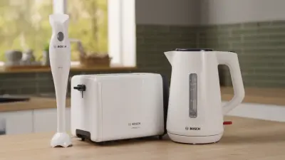 Three white Bosch kitchen home appliances