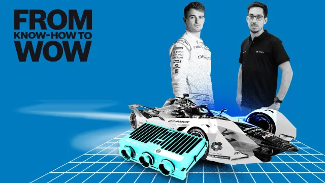 Formula E-Rennfahrer Nico Müller und Bosch-Ingenieur Christian Schimpitz stehen hinter einem Rennauto vom Rennstall Dragon/Penske Autosport. Im Vordergrund ist die Vehicle Conrol Unit von Bosch zu sehen.
