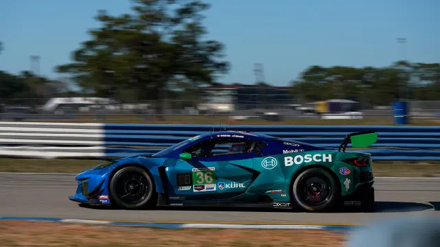 Side view of Wickens' Chevrolet Corvette Z06 TG3.R at full speed on the race track.