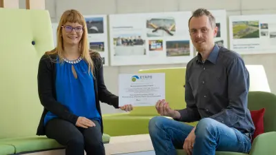 The Bosch researchers, Michaela Klauck and Christian Heinzemann with the TACAS Distinguished Artifact Award which they received at ETAPS 2024.
